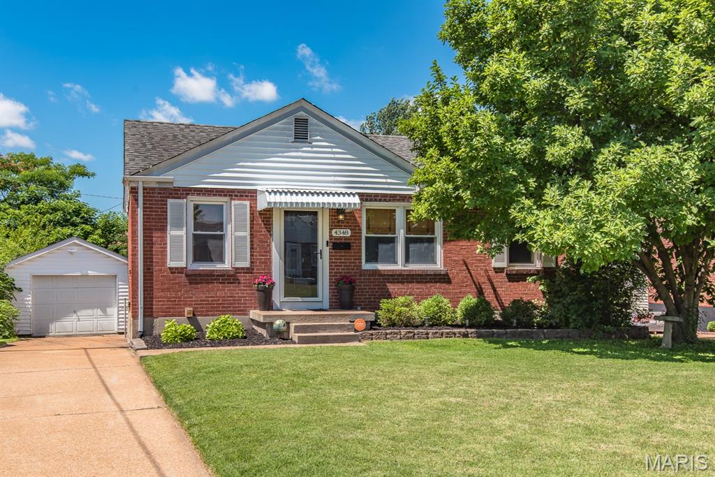 Welcome home to this South City charmer nestled in the sought-after Boulevard Heights neighborhood! From the mature magnolia tree and inviting curb appeal to the spacious interior and backyard, this beautifully kept 2-bedroom, 1-bath brick bungalow offers over 1,600 sq ft of usable living space, including a partially finished lower level and multiple bonus areas throughout the home.
The main level features an inviting open living and dining area with hardwood floors, an updated full bathroom, two comfortable bedrooms, and a versatile bonus room ideal for a home office, nursery, or guest space. Just off the kitchen is a light-filled sun-room perfect for morning coffee, a workspace, or a plant lover’s retreat, with direct access to the backyard and patio.
The partially finished lower level adds even more living space with a large recreation room perfect for entertaining, a workout area, or playroom.
Step outside to enjoy the large fenced backyard complete with a patio, gazebo, and a hard-to-find oversized detached 1-car garage with driveway, offering abundant parking and additional storage.
Conveniently located near parks, restaurants, shopping, and easy highway access, this move-in ready Boulevard Heights gem offers the perfect opportunity to add your own personal touches while enjoying all the space, curb appeal, and outdoor living it has to offer. A home with this much charm and usable space in Boulevard Heights is one you won’t want to miss!
