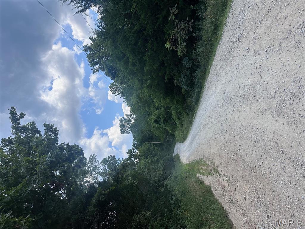 Two adjoining parcels offering a combined 11.4 acres in Southern Jefferson County, available together or separately. 515 Lake Cove Trail consists of 6.4 wooded acres with road frontage/access from both Lake Cove Trail and Lake Park Trail. 2172 Lake Park Trail offers 5 wooded acres with access from Lake Park Trail and includes an older mobile home and small storage shed, both in significant disrepair and included in their present condition with no repairs, removal, or cleanup to be provided by seller. Offered at $80,000 combined or $40,000 individually.

These parcels present an opportunity for recreational use, a private weekend retreat, future homesite exploration, or other potential uses subject to buyer verification, subdivision/association requirements, and applicable county regulations. Wooded terrain, privacy, and proximity to outdoor recreation make this a unique offering. Buyer should independently verify suitability for any intended use, including building, utilities, access, restrictions, and development potential.

Per available information, the development may offer access to Big River and to lake amenities within the subdivision; however, all access points, permitted uses, and any restrictions must be independently confirmed by buyer with the subdivision association and all appropriate authorities. Seller and seller’s representatives make no warranties or representations regarding property condition, boundaries, access, utilities, improvements, permitted uses, association rights, or restrictions.

Sale is being handled through the Jefferson County Public Administrator’s Office. Seller has limited to no knowledge of the property history or condition. Property is being sold strictly as-is, where-is, with all faults. The mobile home and shed on 2172 Lake Park Trail will remain. No disclosures, repairs, inspections, cleanup, or seller-paid improvements will be provided. Any accepted contract is subject to final approval by the Jefferson County Court. Strong due diligence is advised.

Conveniently located within a short drive of Washington State Park, Big River recreation, and additional outdoor destinations in Southern Jefferson County, with Mark Twain National Forest and other regional attractions further south. Any and all offers are welcomed and will be review after 10 days on market.