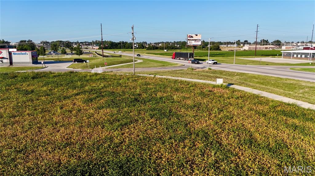 Prime Commercial Development Opportunity! This 9.36 +/- acre tract offers an exceptional opportunity for development in a high-visibility location along the Highway 51 bypass in the heart of Perryville. Zoned C-2 Commercial, the property is suited for a variety of potential uses, including a restaurant, convenience store, retail or business strip, multifamily development, and more.  With its size, location, and commercial zoning, the possibilities are truly endless. Situated just one block from The Bank of Missouri Soccer Complex, 12 miles from the Illinois/Missouri state line and 2 miles from Interstate 55, this property provides excellent access and exposure for a new business, commercial development, or multiple businesses. City utilities are available, adding to the property's development appeal. Don't miss this opportunity to secure a prime piece of commercial real estate in a growing Perryville market!