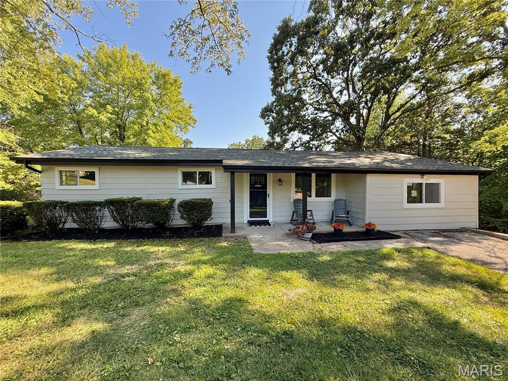 NEWLY REMODELED RANCH WITH TWO PRIMARY SUITES! This beautifully updated 4-bedroom, 3-full-bath home offers a spacious and functional layout with plenty of room for everyone. Featuring two separate primary suites, this home is ideal for those needing flexible living arrangements, guest accommodations, or additional privacy. The home has been newly remodeled and is ready for its new owners! Enjoy the convenience of public sewer, central air, and a comfortable one-level floor plan. The inviting living spaces provide a great setting for everyday living and entertaining. Step outside to enjoy the fenced backyard and back deck, offering a wonderful space for relaxing, entertaining, or letting the kids and pets enjoy the outdoors. The mature trees surrounding the property provide a peaceful, private setting while still being conveniently located near town. With 4 bedrooms, 3 full bathrooms, two primary suites, a newly remodeled interior, fenced yard, back deck, and public sewer, this property offers an exceptional combination of comfort, convenience, and value. Don't miss your opportunity to make this move-in-ready home your own!