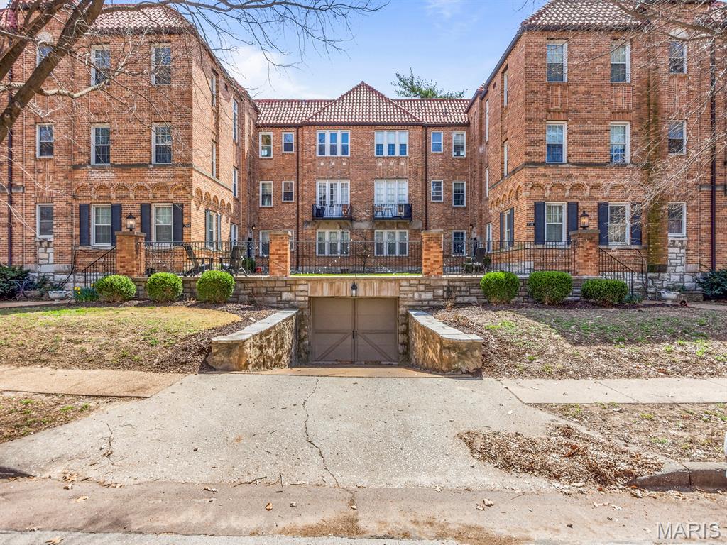 Discover the charm of this highly sought after Moorlands condo, a well maintained second floor residence that blends classic architecture with thoughtful modern updates. This inviting 2 bedroom, 1 bath home features gleaming hardwood floors, abundant natural light, and details that give the space its timeless character. The sophisticated wainscoting elevates the generous living room. The updated kitchen is equipped with stainless appliances, and granite counters, and is adjacent to the dining room.....perfect for entertaining. Both bedrooms offer comfortable proportions and flexibility for guests, a home office, or personal retreat. Additional conveniences include an attached one car garage, a dedicated storage space and a community laundry area. Just minutes from the vibrant heart of downtown Clayton with easy access to dining, shopping and major commuter routes.