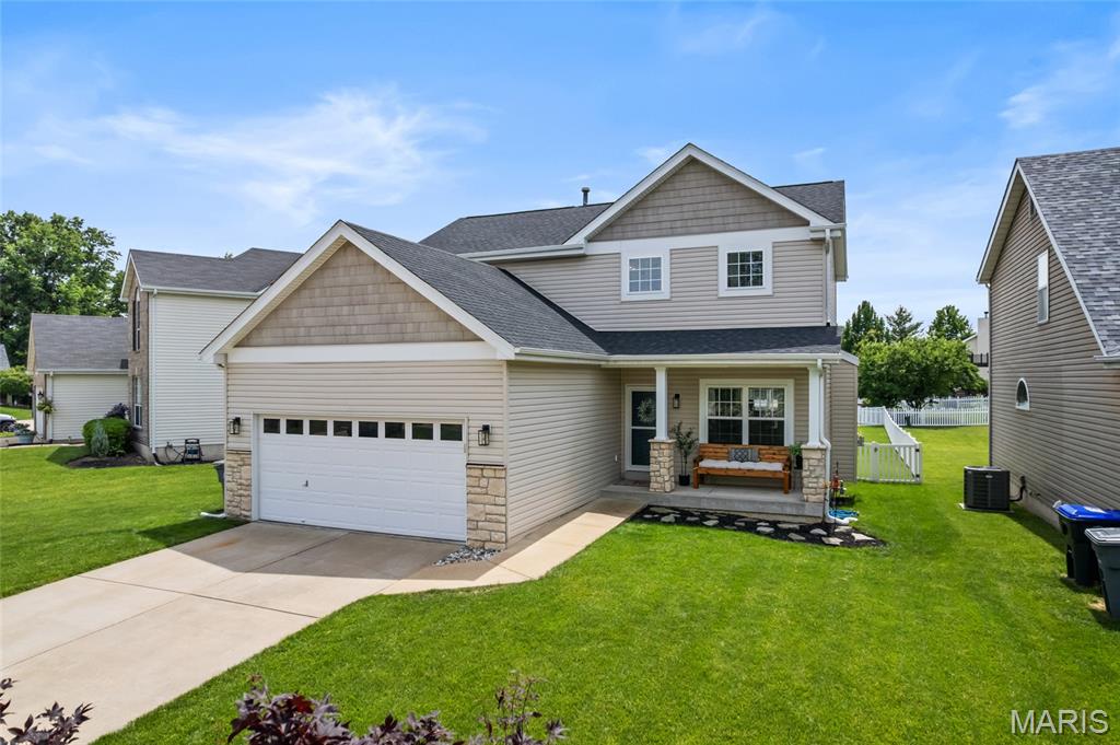 This is the one you’ve been waiting for! Located in the amenity-filled Hyland Green neighborhood, this two-story home offers approximately 2,242 square feet of thoughtfully designed living space. This move-in ready home features 3 bedrooms, 3.5 bathrooms, plus a finished lower-level flex room perfect for a home office, guest space, or possible 4th bedroom.
Situated on a level lot along a non-through street, the curb appeal shines with a welcoming covered front porch, stone accents, architectural shingles (2024), low-maintenance vinyl siding, enclosed fascia and soffits, and attached 2-car garage.
Inside, you’ll find 9-foot ceilings on the main level, laminate wood flooring, and a spacious great room highlighted by a marble gas fireplace. The kitchen is well-appointed with a center island and seating bar, black stainless steel appliances, smooth-top stove, double oven, microwave, dishwasher, natural stone tile backsplash, 42-inch maple cabinetry with crown molding, built-in desk/workstation, and breakfast area.
Additional highlights include a main floor powder room, convenient second-floor laundry, large primary suite with walk-in closet, ceiling fans, and a 50-gallon water heater. The finished lower level offers a spacious rec room with recessed lighting, full bathroom, and versatile office/flex room with closet.
Step outside to enjoy the exposed aggregate patio and fully fenced backyard. Newer HVAC, humidifier, and water heater (2023), and a 2-year-old roof provides peace of mind for years to come. Residents also enjoy access to neighborhood amenities including a pool, playground, and sports courts.