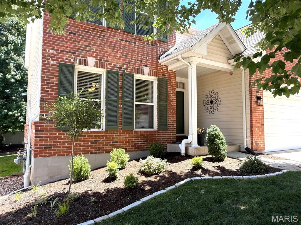 Welcome home to this exceptional property in the desirable Carrollton Manor community!  Offering approximately 3,221 square feet of finished living space, this 3-bedroom, 2.5+ bath home provides the perfect blend of comfort, style, and low-maintenance living.  This residence features an open, inviting floor plan with 9' ceilings on the main level.   The spacious great room flows seamlessly into the dining area and kitchen, creating an ideal gathering space. The updated kitchen boasts ample cabinetry, counter space, an oversized island, and a vented VIKING gas cooktop.  The main floor also has a perfect spot for a home office. Upstairs find a huge Master bedroom with a bonus sitting area and an oversized walk-in closet.  Master bathroom was just remodeled with a new shower, vanities, lights, and mirrors.  Upgrades include flooring, solid surfaces countertops, water heater, and HVAC.  The unfinished LL has rough-in plumbing for a future bath, and it has plenty of room for storage or exercise.  The backyard has a deck, with stairs to a treed yard. Eagle Cove is in a gated community with excellent HOA services that handle lawn maintenance, landscaping, and snow removal.  Additional highlights include a 2-car garage, thoughtful storage throughout, and a prime location in the heart of St. Charles County.  Schedule your private showing today and experience the lifestyle that 13 Eagle Cove has to offer!   Confirm Schools on district website.   Showings begin Fr 6/26, 9am.   Open House Sun 6/28, 1-4pm.