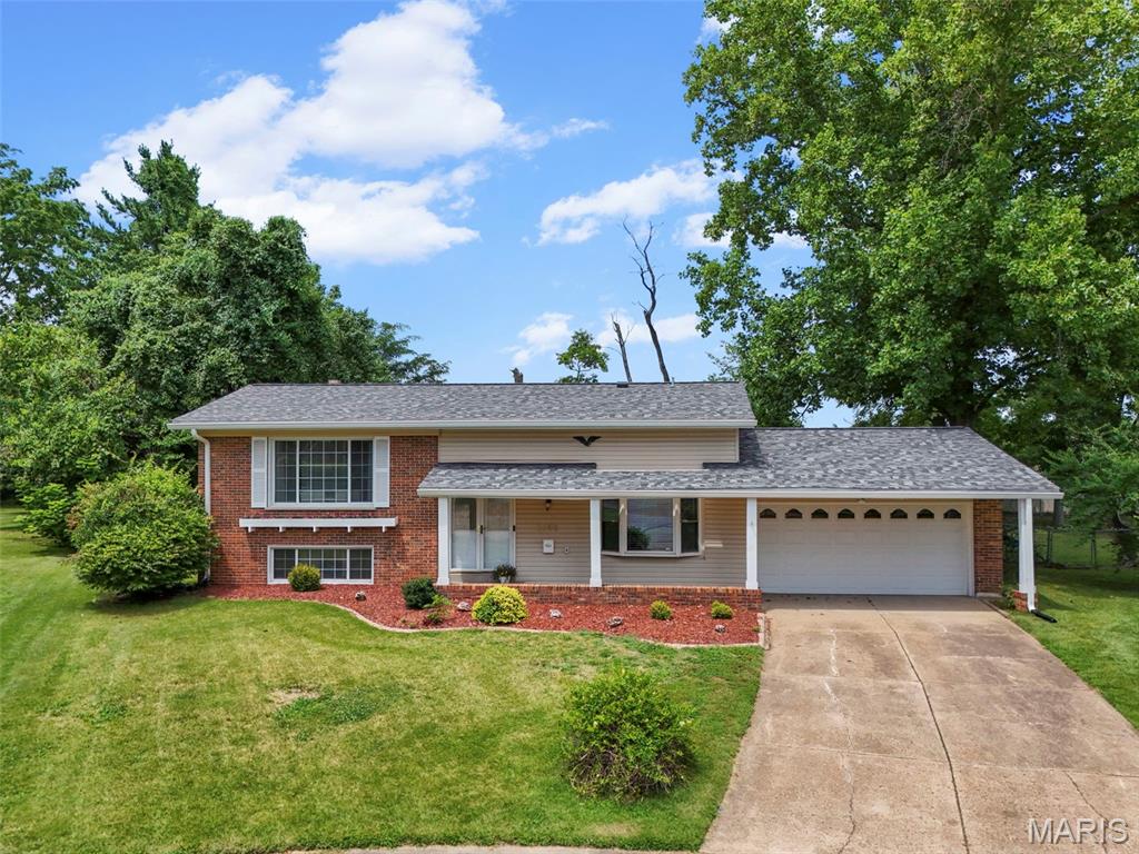 Space, versatility, and thoughtful updates come together in this beautifully refreshed 4-bedroom, 3-full-bath home offering over 1,600 square feet and tucked away on a cul-de-sac in the established Parc Chateau 2 subdivision. Freshly painted throughout the entire home, this move-in-ready property offers multiple living spaces and a flexible floor plan designed for the way you live today.

Step inside to an updated eat-in kitchen featuring granite countertops, rich cabinetry, a decorative tile backsplash, stainless-steel appliances, and generous space for everyday dining. Just a few steps up, the bright and inviting main living area is filled with natural light. This level also features three bedrooms, including a spacious primary suite with a private full bath, plus a second full hall bathroom.

The finished lower level expands the possibilities with a fourth bedroom, third full bathroom, and additional living and sitting space anchored by a distinctive statement fireplace. Whether used for guests, a home office, recreation, or simply more room to spread out, this flexible space easily adapts to your needs. The lower level walks out to the patio and level backyard, creating an easy connection to outdoor living and entertaining.

Major updates include a new furnace and air-conditioning system installed in 2024, providing added peace of mind. A 2-car attached garage, three full bathrooms, multiple living spaces, and a cul-de-sac setting complete the package.

Fresh, spacious, and move-in ready, 2255 Barcelona Drive delivers the space you need, the flexibility you want, and thoughtful updates you’ll appreciate from day one.