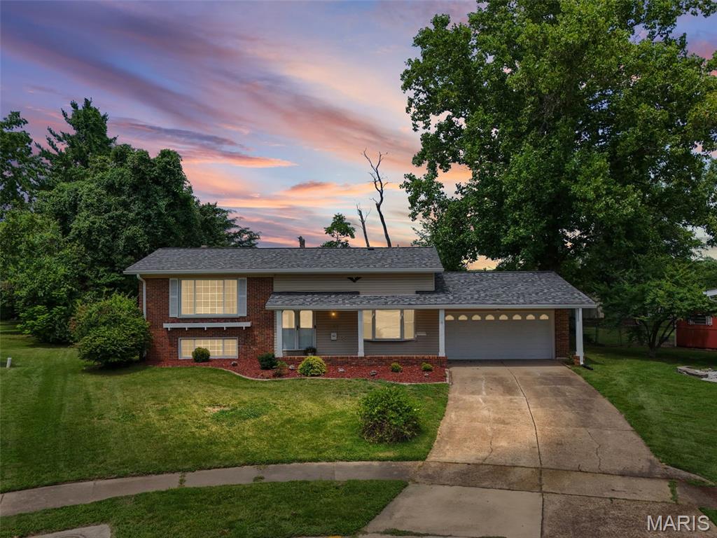 Space, versatility, and thoughtful updates come together in this beautifully refreshed 4-bedroom, 3-full-bath home offering over 1,600 square feet and tucked away on a cul-de-sac in the established Parc Chateau 2 subdivision. Freshly painted throughout the entire home, this move-in-ready property offers multiple living spaces and a flexible floor plan designed for the way you live today.

Step inside to an updated eat-in kitchen featuring granite countertops, rich cabinetry, a decorative tile backsplash, stainless-steel appliances, and generous space for everyday dining. Just a few steps up, the bright and inviting main living area is filled with natural light. This level also features three bedrooms, including a spacious primary suite with a private full bath, plus a second full hall bathroom.

The finished lower level expands the possibilities with a fourth bedroom, third full bathroom, and additional living and sitting space anchored by a distinctive statement fireplace. Whether used for guests, a home office, recreation, or simply more room to spread out, this flexible space easily adapts to your needs. The lower level walks out to the patio and level backyard, creating an easy connection to outdoor living and entertaining.

Major updates include a new furnace and air-conditioning system installed in 2024, providing added peace of mind. A 2-car attached garage, three full bathrooms, multiple living spaces, and a cul-de-sac setting complete the package.

Fresh, spacious, and move-in ready, 2255 Barcelona Drive delivers the space you need, the flexibility you want, and thoughtful updates you’ll appreciate from day one.