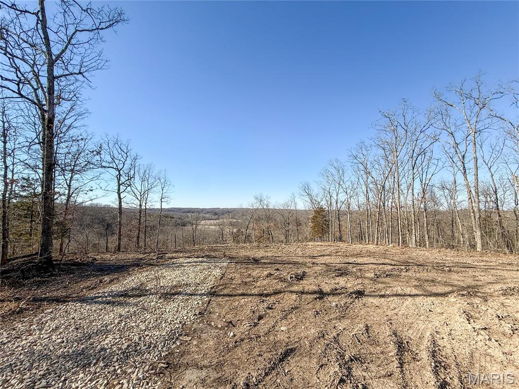Rare 24.71-Acre Country Retreat.  Spring Bluff School District
Hard to come by and truly unique, this beautiful 24.71 acre property offers the perfect blend of country living, convenience, and opportunity. Located on a paved road within the acclaimed Spring Bluff School District, this land is ideal for families looking to raise their children in a safe environment rooted in heartland values, space, and freedom.
Enjoy stunning views and the peaceful setting of rolling countryside, complete with a natural spring on the property, a rare and valuable feature. Whether you envision building your dream home, starting a small farm, or simply enjoying wide-open spaces, this land provides endless possibilities.
Outdoor enthusiasts will love the proximity to Long Ridge State Park, offering nearby horse trails and public hunting access. Despite the tranquil rural setting, the property offers easy access to I-44 and is conveniently located approximately one hour from St. Louis, making commuting or weekend trips a breeze.
Opportunities like this don’t come along often. Acreage of this size, with paved road access, electric trenched-in allowing easy access right off of Ridge Road, top-rated schools, natural features, and breathtaking views is increasingly rare. Secure your piece of the countryside and create the lifestyle you’ve been dreaming of.
