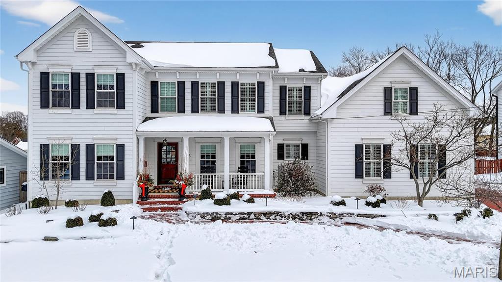 Meticulously Maintained and Expertly Renovated Two Story in the Heart of Kirkwood! Turn Key Home with over 5,000 total sq ft of living space has been impeccably kept.  Welcoming Front Porch and Stately wood front door with glass inlay. Warm, Refinished hardwood floors greet you upon walking in and run throughout main level. Separate dining room and living Room both with wainscoting flank entry foyer. Family Room with gas fireplace and built in shelves opens to spacious breakfast Room with bay window and new glass sliding door (2022). Recessed lighting and built in speakers add to high end feel. Chef’s Dream kitchen with large center island, Upgraded Stainless steel appliances including 6 burner gas stove and wine fridge. Custom cabinetry with glass paneled cabinets all with quartz counter tops. Walk in pantry and Custom light fixtures. Mudroom with built in lockers for the Fam. Upstairs Primary Bedroom w coffered ceiling and walk in closet. Primary bath completely remodeled (2025) with His/Her vanities and free standing tub. Custom steam shower with ceramic tile, full glass surround, and brushed gold fixtures. Spectacular! Three others beds for the Fam upstairs all with newer carpet. Plantation shutters as well! Double sink and tub/shower combo in bath 2. Custom laundry room with designer tile and built in desk space. Finished LL with new flooring throughout (2022), full bath, and basement built ins. Tons of extra space for friends and guests.  Sleeping area could easily be converted to bedroom.  Lower Level Sauna stays with home. Brick Paver driveway with 3 car side entry garage with new doors. New Fence (2023) leads to Level, flat backyard.  Perfect for adding pool if desired. Stone patio with built-in bbq grill and outdoor fireplace.  All of this within easy walking distance to desirable Keysor Elementary and all things Kirkwood! Truly rare opportunity to own a high end home with all the right updates!