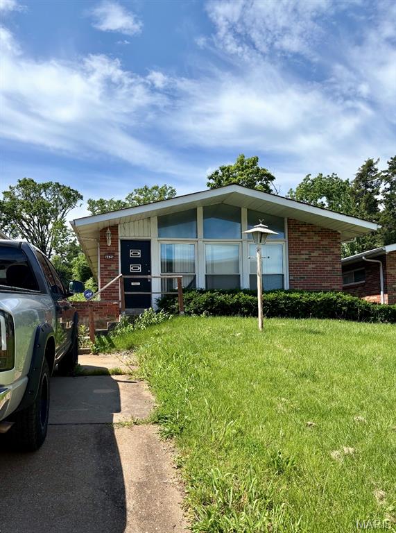 Attention investors, contractors and rehabbers! This all-brick 3 bed 1.5 bath home is ready for your transformation. Includes a spacious floor plan, eat-in kitchen, 3 bedrooms, 1.5 baths, basement and off street parking. Nice sized backyard with a paved patio area. Off-street parking pad in the front for up to 3 or more vehicles. Property is in need of a renovation and is being sold AS-IS. Seller has no knowledge of the property or its condition. Please complete due diligence before submitting your offer. No seller financing. Great opportunity for an experienced investor seeking a renovation project or an addition to their rental portfolio. Don't miss it!