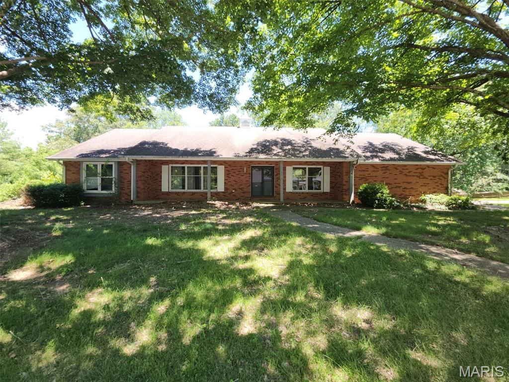 Welcome home to this spacious 2-story property in Scott City, offering approximately 3,679 square feet of designed living space. Featuring 5 bedrooms and 3 full bathrooms, this home provides a generous layout for living and entertainment. The main level flows seamlessly out to a welcoming porch and a private backyard patio, which overlooks an inviting private pool. Complete with a 3-car attached garage for ample storage and parking.