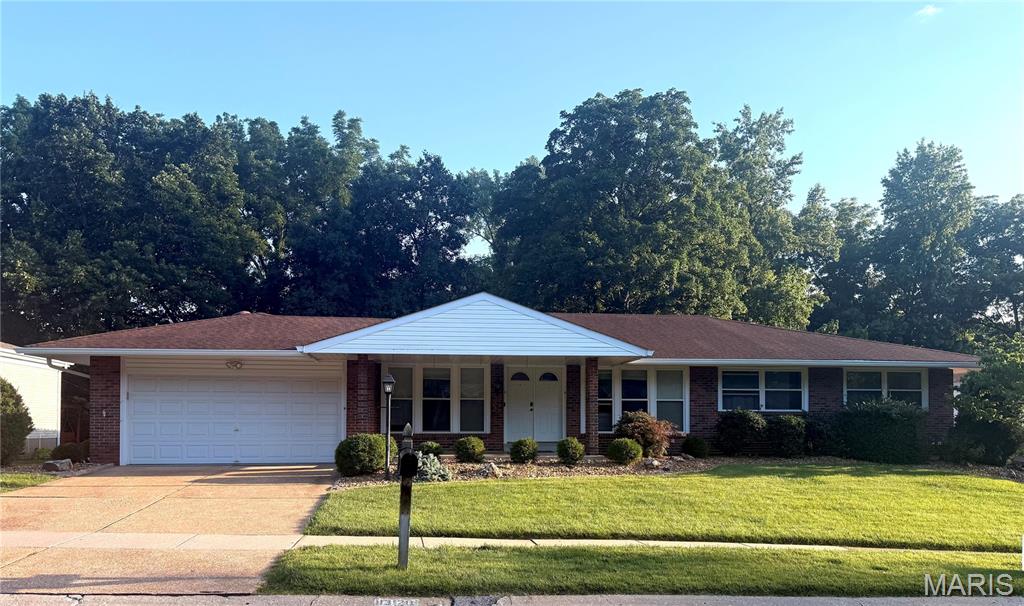Welcome to this beautifully updated and exceptionally spacious brick ranch in the highly sought-after Old Farms Subdivision! From the moment you enter the foyer, you'll appreciate the thoughtful layout, with a welcoming living room featuring built-in shelving on one side and a versatile dining room or home office on the other.
The heart of the home is a chef’s dream kitchen designed to impress. A stunning oversized center island with granite countertops serves as the focal point, complemented by premium appliances including a gas cooktop with range hood and pot filler, double ovens, built-in oversized refrigerator/freezer, wine refrigerator, ice maker, and built-in microwave. Rich solid maple cabinetry provides both beauty and abundant storage.
Open to the kitchen, the cozy hearth room with fireplace and adjoining breakfast nook create the perfect gathering spaces for family and friends. The main level offers four generously sized bedrooms and two beautifully updated full baths. The spacious primary suite features a luxurious en-suite bath and a custom-designed closet system.
The freshly painted lower level provides exceptional flexibility with a large, finished living area ideal for a recreation room, home gym, media space, or playroom. A sleeping area, full bath, laundry room, and ample storage—including a newly installed wall of closets—complete the lower level.
Step outside to your own private retreat. The fully fenced backyard backs to a scenic wooded area and offers multiple outdoor living spaces, including a multi-level deck, stamped concrete patio, and charming stone fireplace—perfect for entertaining or relaxing year-round.
In addition, the residents of Old Farms neighborhood enjoy using the community pool. This move-in-ready home combines timeless charm, modern updates, and an unbeatable location.
