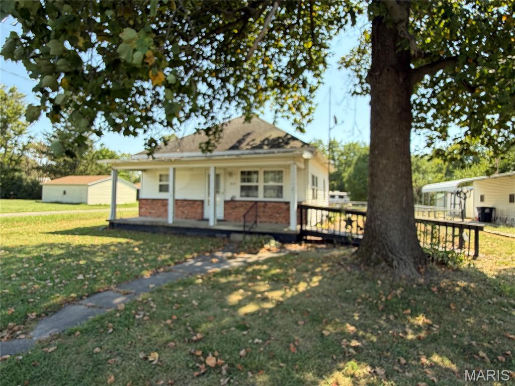 Tired of High Rent??? Want to own your own place? 
Take a look at this cozy affordable 2 bedroom home that sits on 2 lots with a corner location.  This property also offers a  carport that has a concrete pad with attached storage  along with a  detached portable shed. The outside of the home has an architectural shingled roof, soffits are covered and gutters were in place.  It has vinyl siding, vinyl windows, Central Air, Gas heat, City water and Sewer.  The inside of the home is nice and cozy and the kitchen has been recently updated.  This property is ready for it's new owner!!!
