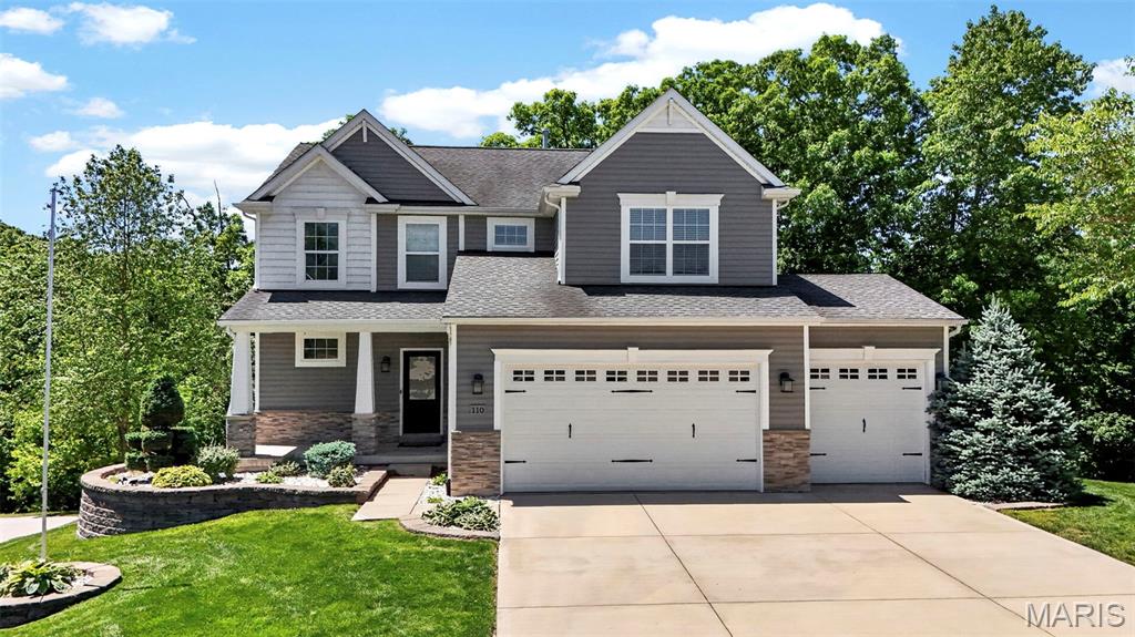 Welcome to 110 Little Tree Ct- this stunning 2 story 4 bed, 2 1/2 bath Craftsman home is tucked away on a quiet cul-de-sac. The light filled living area is flanked by large windows and outfitted with an eye catching feature wall. Long stretches of countertops, custom backsplash, gorgeous 42 in cabinetry, and deep well sink will delight the chef in your family. The four bedrooms upstairs are generously sized with plenty of closet space, plus super conveniently located 2nd floor laundry and incredible loft space for extra living area. The walkout basement has roughed in plumbing and is ripe with potential. The beautiful deck and concrete patio are perfect for outdoor entertaining.