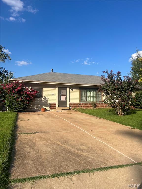 Opportunity awaits on a quiet, cozy street! This home offers plenty of space and a beautiful lot with mature landscaping, making it a great opportunity for someone looking to update and make it their own or add to their investment portfolio. The main level features 3 bedrooms plus a spacious bonus family room/flex space with walkout access to the fenced backyard. The basement adds 2 additional rooms, a bathroom, and abundant storage. Major systems have been updated, including an HVAC system approximately 6–7 years old, roof approximately 12 years old, and soffit/fascia approximately 5 years old. This home is to be sold as-is. With a solid layout, generous living space, and a lovely setting, this home has plenty of potential to shine.