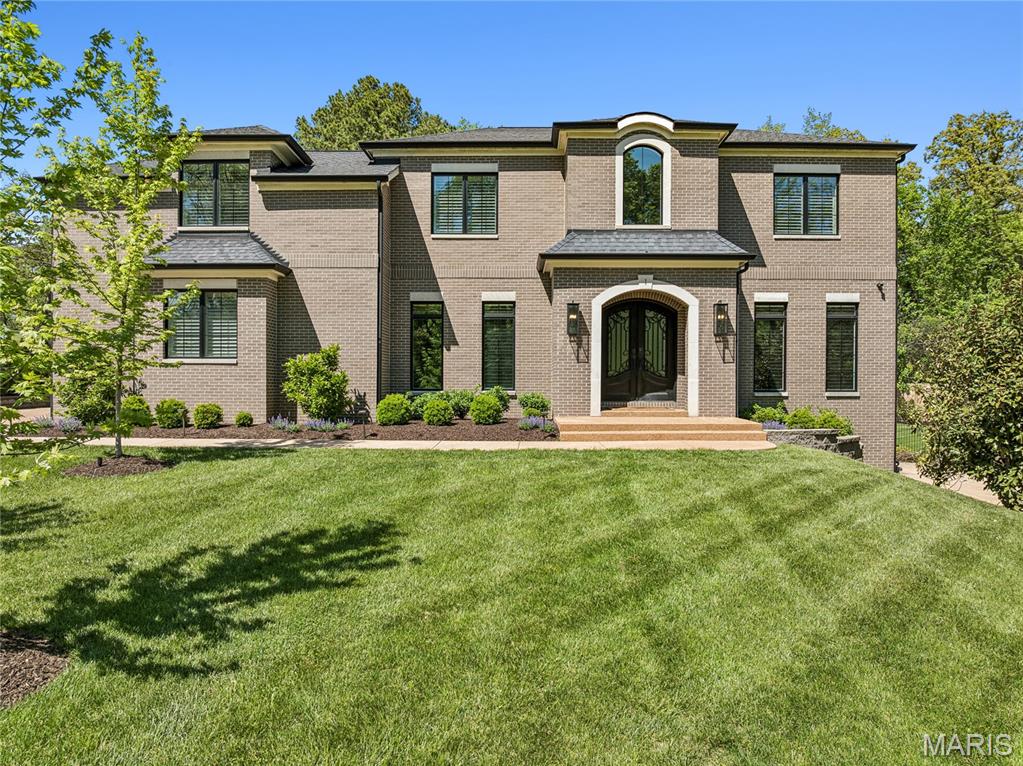 Welcome to 1 Tuscany Park, a fully turnkey residence that does not whisper luxury, it commands it.

Set within one of Clayton’s most coveted enclaves, this rare architectural statement pairs park-like surroundings and views toward Oak Knoll Park with the kind of scale, finish, and presence seldom found in the St. Louis market. For buyers searching for a luxury new-build alternative in Clayton, this is the answer: a newer custom home that is fully realized, fully upgraded, and truly move-in ready. No waiting on plans, allowances, contractors, landscaping, or punch lists. Just immediate enjoyment. Better than building new, without the typical 18-month timeline.

Spanning more than 7,500 square feet, the home lives with the polish of a designer showcase and the functionality of a residence built for real life. A soaring two-story entry, private office, sunlit dining room, expansive great room, and chef’s kitchen create a seamless everyday flow, while the main-level primary suite offers the privacy, comfort, and convenience today’s luxury buyers expect. Upstairs, generous en suite bedrooms and a flexible loft continue the home’s thoughtful layout, and the lower level delivers a true entertaining destination with a theater, fitness studio, custom wet bar, fifth bedroom, and full bath.

The location is equally compelling. DeMun’s beloved restaurants and neighborhood favorites are close at hand, WashU is nearby, and Wydown’s dining scene and downtown Clayton are just a short drive away, creating the kind of connected, lifestyle-rich setting that appeals to buyers who want both prestige and convenience.

For a relocating executive or discerning St. Louis buyer, 1 Tuscany Park checks every box: newer construction, turnkey condition, immediate livability, and fast access to some of the region’s most prominent corporate, medical, and university employers, including Centene in Clayton, WashU and BJC in the Central Corridor, Enterprise Mobility in St. Louis County, Edward Jones in Des Peres, World Wide Technology in Maryland Heights, and Bayer and RGA in Chesterfield. This is a true executive relocation home: refined, low-friction, and ready to move into from day one.

Throughout, custom window treatments, designer lighting, smart storage, a three-car garage, and beautifully curated outdoor spaces reinforce what makes this property so rare: it offers the freshness and ease buyers associate with new construction, but with the advantage of being completely finished, fully customized, and available now. In a market where truly turnkey luxury is hard to find, 1 Tuscany Park stands apart.