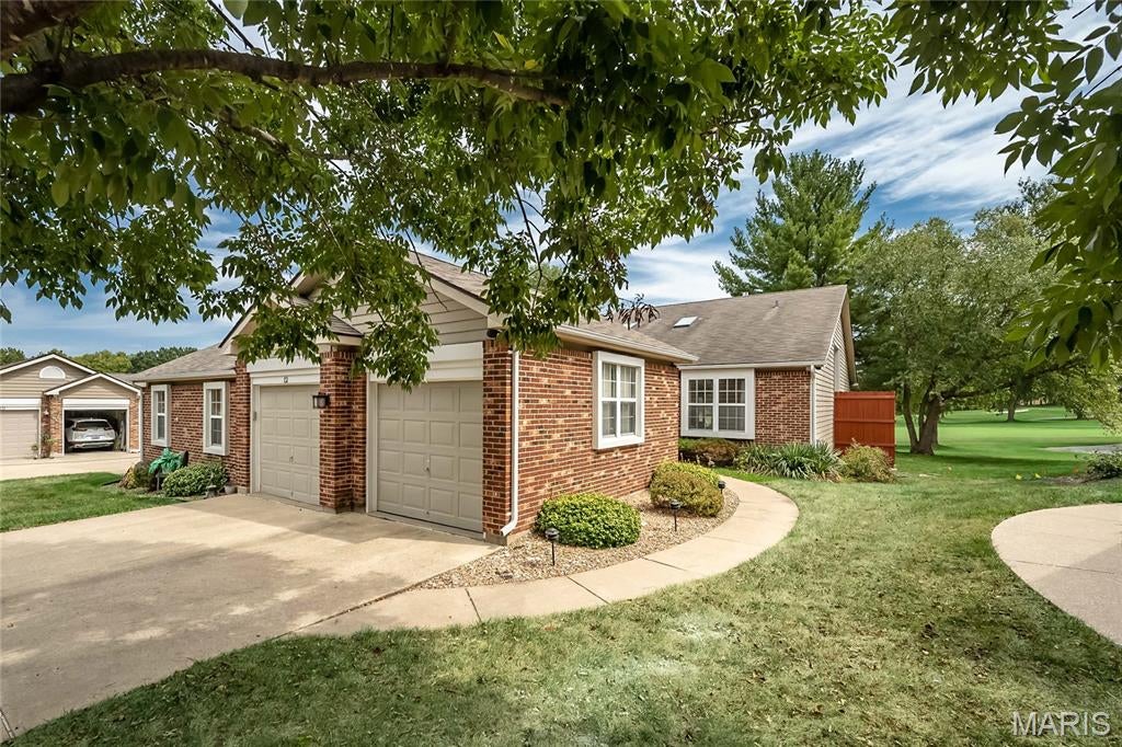 Situated right in the heart of Lake St Louis, this bright and beautiful townhome provides comfortable, low-maintenance living and features peaceful golf course views and manicured landscaping. 

The main level is thoughtfully designed for everyday comfort, featuring two bedrooms and two full bathrooms, including a spacious primary suite with a double sided fireplace. 

The finished lower level adds even more versatile living space, complete with an additional bedroom, full bathroom, and comfortable living area. Whether used for guests, a home office, a hobby space, or a recreation room, this level offers plenty of flexibility to fit your lifestyle. An additional unfished utility area is perfect for storage.

With low HOA dues, well-maintained updates, and abundant nature, this home offers an appealing combination of comfort, convenience, and style in a desirable Lake Saint Louis location. Property is being sold AS-IS