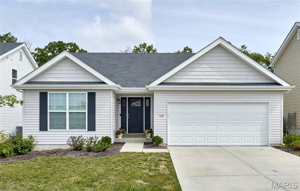 Welcome home to this nearly new 2024 built, 4 bedroom, 3 bathroom ranch home with tons of amazing features to love! This home is completely move-in ready and boasts open floor plan, luxury vinyl plank flooring throughout, fresh paint, finished lower level, huge patio, and more! The spacious great room flows into the dining room and kitchen with the full vaulted ceiling, luxury vinyl plank flooring, and lots of natural light. The gorgeous kitchen boasts ample custom cabinetry, stainless steel appliances, breakfast bar, and access to the main floor laundry and 2 car garage. The dining room provides easy access to the massive, oversized patio with new, custom staircase and is perfect for entertaining! The primary bedroom suite offers a spacious walk in closet and ensuite bathroom boasting double sink vanity and walk in shower. Two additional bedrooms and a full hall bathroom finish out the main floor. The finished lower level offers tons more living space to love with beautiful luxury vinyl plank flooring, recessed lighting, fresh paint, full bathroom, the unique 4th bedroom with egress window, and plenty of storage space. Situated in the Wentzville School District just minutes from shopping, restaurants, parks and everything Wentzville has to offer! Don’t miss your opportunity to own this like-new gem!