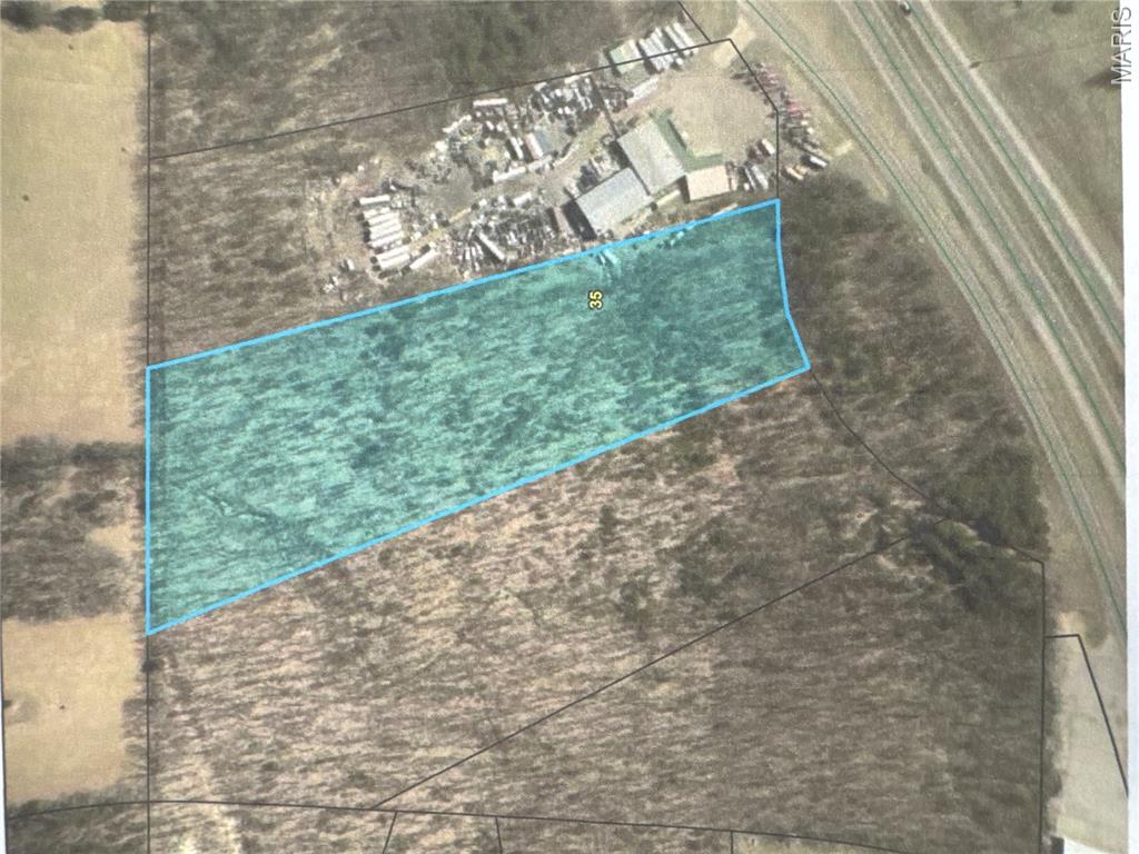 Exceptional opportunity to own 7.89 acres of commercial land in growing St. Clair, MO. Ideally positioned on the North Service Rd just past the 239 Exit ramp, this property offers approx 250 ft of road frontage with excellent visibility and development potential in a high traffic corridor. Currently in its natural state, the land provides a versatile blank slate for investors, developers, or business owners ready to build to suit their needs. The site is well suited for a variety of commercial uses such as retail, office, hotel, storage, warehouse or mixed use development (subject to zoning and approvals) Currently zoned CA but zoned A with Franklin County P&Z. Located just an hour from St. Louis and an hour from Rolla. Additional 9.4 acres available also if needing more space.