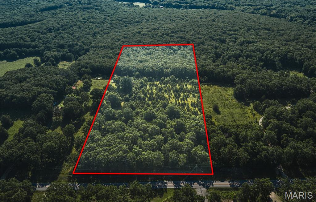 Discover the perfect setting for your dream home on this beautiful 9.93-acre property on a paved road offering the ideal balance of privacy, convenience, and breathtaking views. Whether you're envisioning a custom home, hobby farm, or peaceful country retreat, this property provides the space and flexibility to bring your vision to life. Situated on a paved road, access is easy year-round while still maintaining the quiet atmosphere and scenic surroundings that make country living so desirable. The gently rolling landscape and excellent layout create multiple potential building sites, allowing you to take full advantage of the stunning views and natural beauty that surround you. Imagine starting each morning with coffee on your future porch while taking in wide-open skies and peaceful countryside. With nearly 10 acres to call your own, there's plenty of room for outdoor recreation, gardening, animals, or simply enjoying the privacy and tranquility that come with owning acreage. Convenience is never far away, with Interstate 44 just a quick 5-minute drive from the property, making commuting and travel simple while still enjoying the benefits of a rural setting. Opportunities like this are becoming increasingly difficult to find. If you've been searching for the perfect place to build your forever home and create the lifestyle you've always wanted, this property deserves a closer look. Schedule your private tour today and start planning your future on this exceptional piece of land!