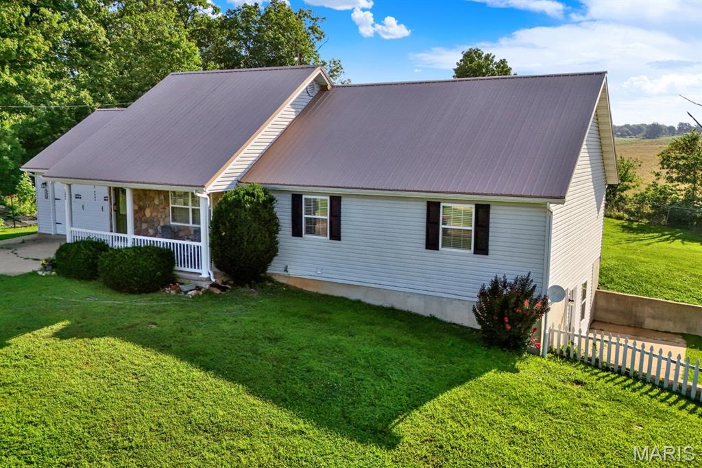 Here are some highlights:
Peace of Mind: High-efficiency York electric HVAC with heat pump includes a 9 YEAR Warranty! 
ALL appliances stay! Termite-free inspection completed on 7/13/26 (good for 90 days)! 
Location:Close to Fort Leonard Wood and state park entrances. Tucked away at the end of a quiet lane in a family-friendly neighborhood. 
Outdoor Living: Fully fenced backyard, separate fenced garden & a greenhouse! 
Bonus Perks: The garage comes with 5 workbenches. Kitchen island stays.
 ***Can’t check out this home in person ? Take the Virtual tour & drone flight!***


--