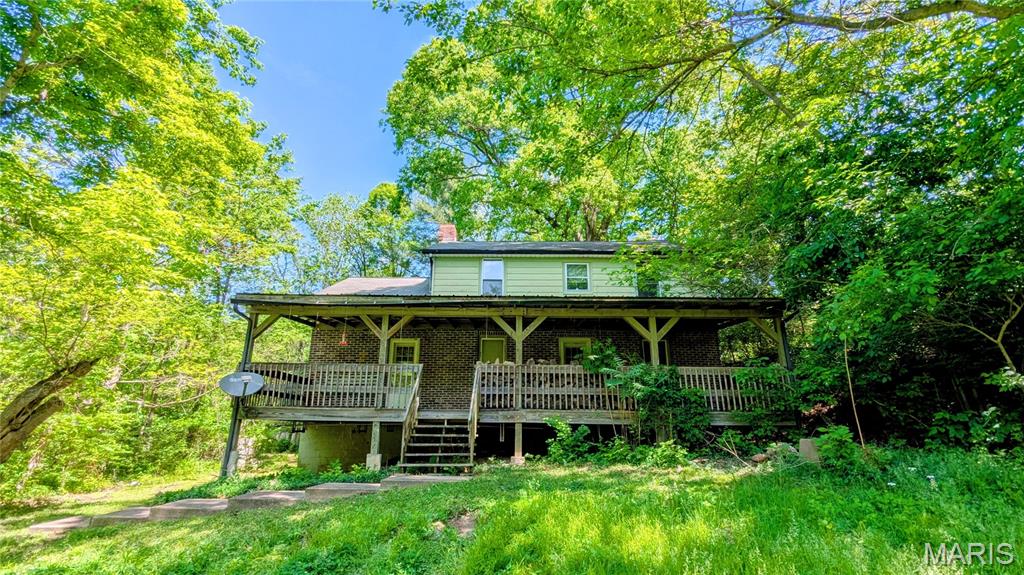 Calling all FLIPPERS, INVESTORS, and DREAMERS: This secluded home sits on over 2 unique acres and is loaded with potential and ready for you to bring your dreams and your tools. Being sold AS-IS. Cash or Cash equivalent. Buyer/Buyer's agent to verify all information to their satisfaction. Video/Audio monitoring on premises. Call your favorite agent today to schedule your private tour.