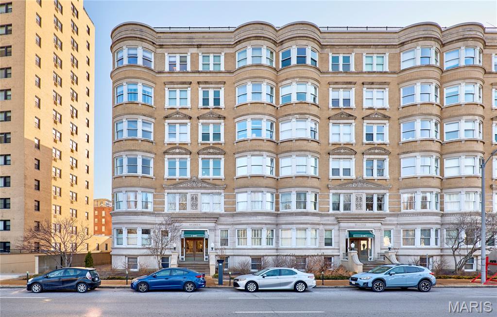Located in the heart of the sought-after Central West End, this beautifully updated 2-bedroom, 2-bath residence blends classic character with modern convenience. Step inside to find a warm and inviting living room anchored by a cozy fireplace and stunning built-in shelving that evokes the charm of a private library—perfect for displaying books, art, and treasured collections. The dining room continues the theme with plenty of custom shelving and plenty of room for a large dining table. The updated kitchen boasts sleek finishes and a thoughtful layout ideal for everyday living and entertaining. Both bathrooms have been tastefully renovated, offering a spa-like feel and move-in-ready appeal. An in-unit laundry adds everyday ease and convenience. Take advantage of rare outdoor living with a rooftop deck and garden area—an ideal retreat for morning coffee, evening gatherings, or enjoying city views. Situated directly across from Forest Park and just minutes from major hospitals and highways, this location offers unbeatable access to everything St. Louis has to offer, from dining and culture to commuting ease. Urban sophistication, outdoor space, and an exceptional location—this Central West End gem truly has it all.
