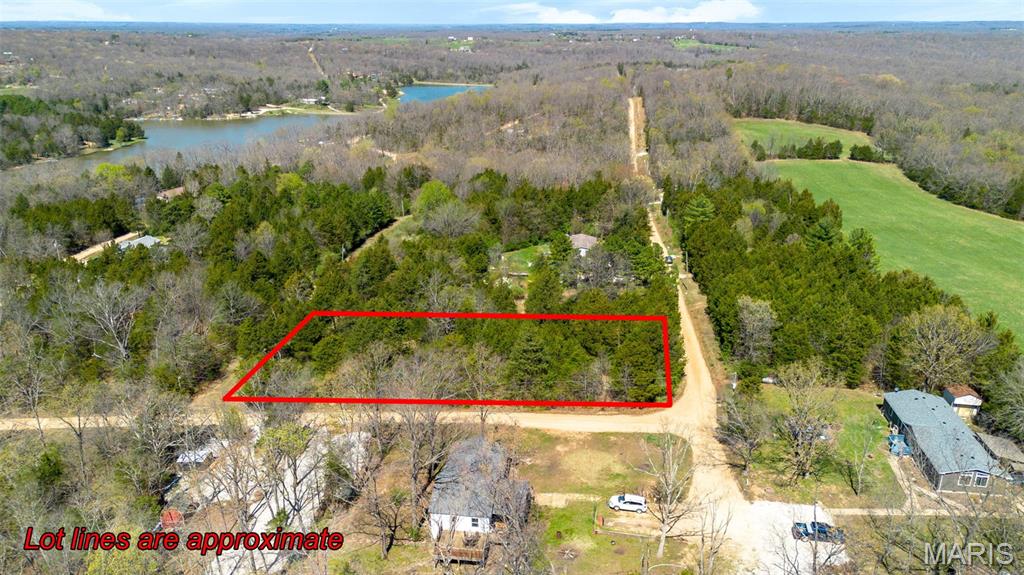 Escape the hustle and build your dream retreat on this beautiful .20-acre wooded corner lot in the sought-after Lonedell Lake Community. Surrounded by nature, this property offers the perfect blend of privacy and peaceful lake living. Whether you’re planning a full-time residence or a weekend getaway, this lot is full of potential. Enjoy the sights and sounds of wildlife right from your future porch, and take advantage of the community’s 3 lakes for fishing, swimming, and relaxing gatherings under the pavilion. With its desirable corner location and natural wooded setting, this is your chance to create your own slice of paradise. Opportunities like this don’t come along often—come explore it today and start living the good life!