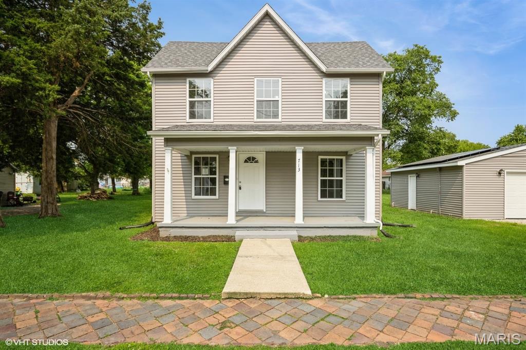 This recently updated two-story home offers approximately 1,600 square feet of comfortable living space. The main level features a spacious living room, an eat-in kitchen with a convenient laundry closet, a primary bedroom with a private full bath, and an additional full bathroom. Upstairs, you'll find two additional bedrooms, providing plenty of space for family, guests, or a home office.

Exterior amenities include a welcoming covered front porch, a rear patio perfect for outdoor enjoyment, and a detached two-car garage.

Recent improvements include a new front door, fresh interior paint, new luxury vinyl plank flooring and carpet throughout, freshly painted kitchen cabinets with updated hardware, select new interior doors, and new lighting fixtures and hardware.

This is a Fannie Mae HomePath property.