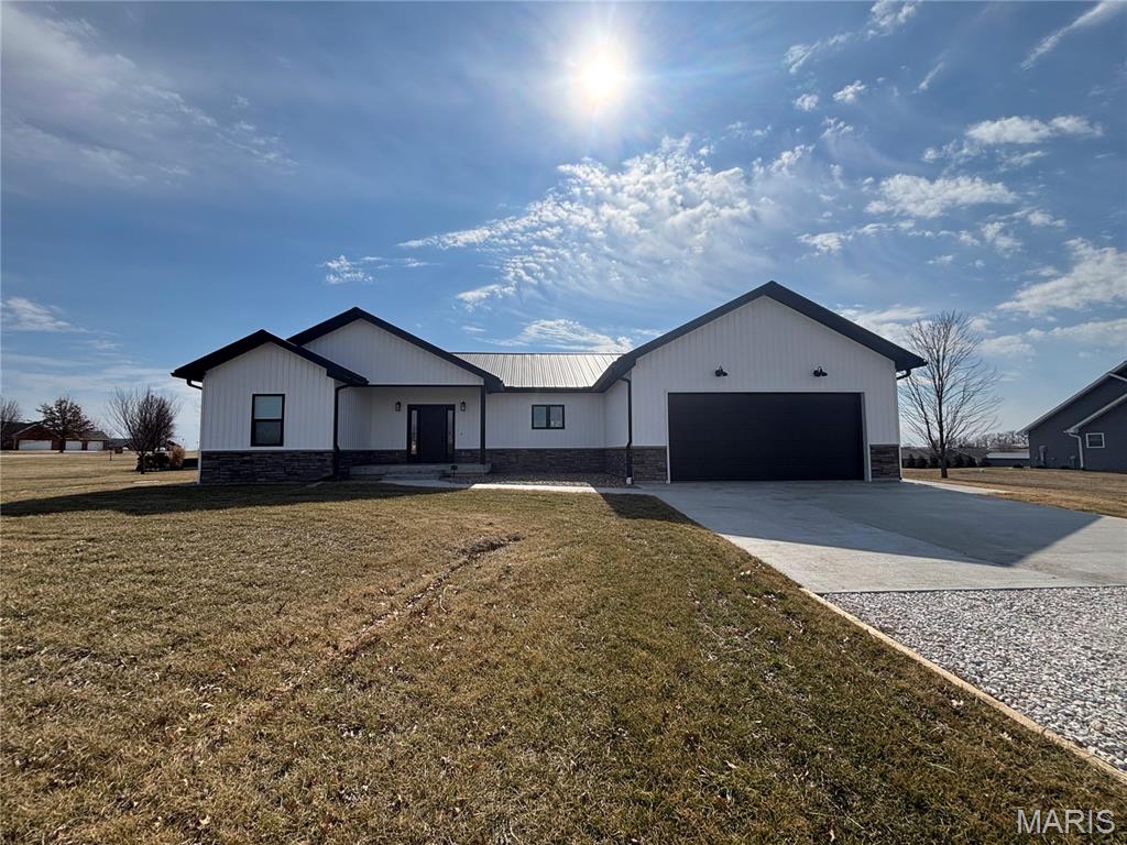 Check this one out! New construction on a spacious 1-acre lot in Palmyra! This thoughtfully designed 3-bedroom, 2-full-bath home offers modern style with quality craftsmanship throughout. The open, functional layout is complemented by 6” exterior walls, providing added efficiency and durability.
The primary suite features a luxurious onyx shower in the master bathroom, adding a sleek, upscale touch. Downstairs, the full basement offers incredible potential with a roughed-in bedroom and bathroom, making future expansion simple—perfect for additional living space, guests, or a home office. Among many upgraded features, the roof is also a textured hidden fastener standing seam metal roof.
Enjoy the peace of country-style living with room to breathe, while still being conveniently located. New construction, quality finishes, and space to grow—this one checks all the boxes. Call today for a private showing!
