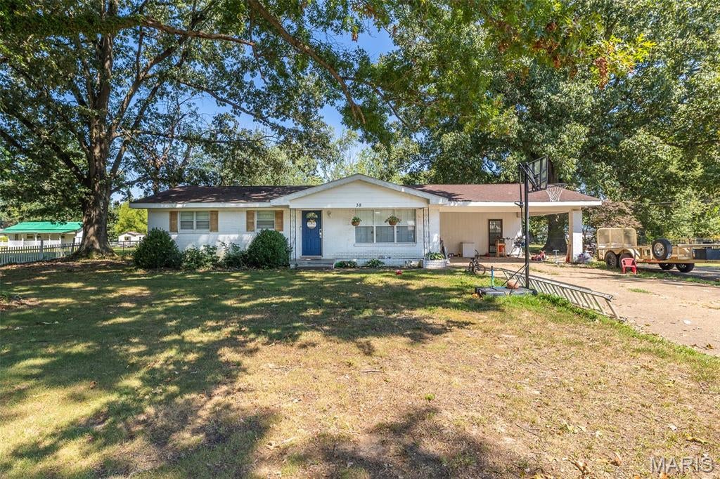 Check out this charming 3-bedroom, 1.5-bathroom home conveniently located on the outskirts of town. From the moment you arrive, the quaint and inviting front yard creates a warm welcome.
Inside, the comfortable living room flows seamlessly into the kitchen, which offers plenty of space for a dining table—perfect for everyday meals or entertaining guests. Step outside to discover a spacious, fully fenced backyard with endless possibilities. The property also includes a generous 12-by-14-foot storage shed, providing plenty of room for tools, equipment, seasonal items, and more. With its convenient location, functional layout, and versatile outdoor space, this home is ready to welcome its next owner.