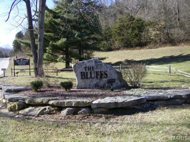 BUILD YOUR DREAM HOME WITH A LEVEL  4.03 ACRE WOODED HILLTOP LOT.
ENJOY COMMON AREAS WITH  2 LAKES, CENTRAL SEWER, EXCELLENT ARCHITECTURAL CONTROL, NORTH WEST SCHOOLS,GREAT VIEWS,WIDE ASPHALT STREETS,UNDERGROUND ELECTRIC,LOT MARKED IN FIELD WITH T POSTS AND ORANGE FLAGGING TAPE.