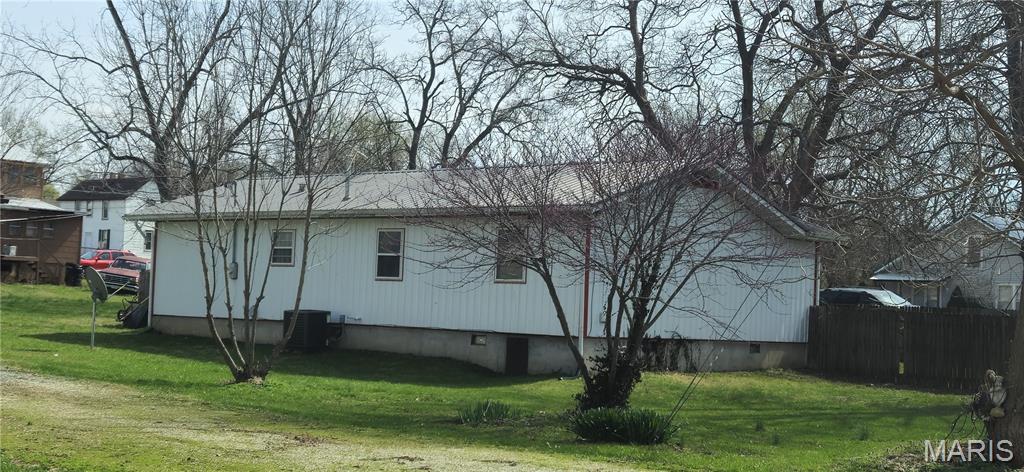 REDUCED!  3 Bedrooms!  1.5 baths! Main floor living! Home has durable metal siding and a metal roof providing long-lasting, low-maintenance living, while major updates—including an updated HVAC system with central air and a hot water heater installed in 2022—offer peace of mind.
The kitchen comes fully equipped with appliances that stay, making move-in easy. A bonus room in the converted garage adds flexible space perfect for a home office, hobby room, playroom, or extra living area.  Privacy fenced yard, situated on a corner lot.
Best of all, you’ll love the convenient location near schools, shopping, the city park, and the community pool—everything you need just minutes away!
Don’t miss this great opportunity to own a comfortable, move in ready home.