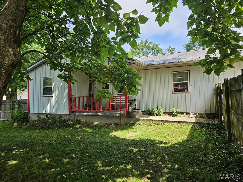 Comfortable 3-bedroom, 1.5-bath single-level home conveniently located on a corner lot right in town! Home has durable metal siding and a metal roof providing long-lasting, low-maintenance living, while major updates—including a new HVAC system with central air and a hot water heater installed in 2022—offer peace of mind.
The kitchen comes fully equipped with appliances that stay, making move-in easy. A bonus room in the converted garage adds flexible space perfect for a home office, hobby room, playroom, or extra living area.  Privacy fenced yard, situated on a corner lot.
Best of all, you’ll love the convenient location near schools, shopping, the city park, and the community pool—everything you need just minutes away!

Don’t miss this great opportunity to own a comfortable, well-maintained home in a fantastic in-town location.