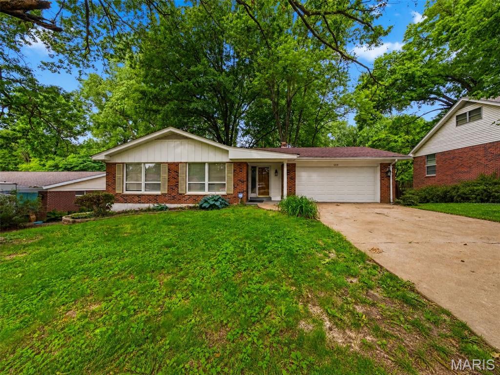 Spacious and move in ready 3 bedroom 2-bath brick home offering plenty of room to live, work, and entertain, The inviting floor plan features a living room, dining room, and family room, providing multiple gathering spaces for everyday living and special occasions. Enjoy the warmth and charm of the woodburning fireplace in the inviting family room. The large deck provides the perfect space for outdoor dining, entertaining, or simply relaxing. The fully finished basement adds valuable living space and offers endless possibilities for a recreation room, home office, workout area or additional gathering space.  Additional features include a 2-car garage, generous room sizes and a classic brick exterior. Conveniently located near shopping, dining, parks, and major highways. Sellers are offering a 1-year HSA home warranty for added peace of mind. This home is ready for its next owner to make it their own.