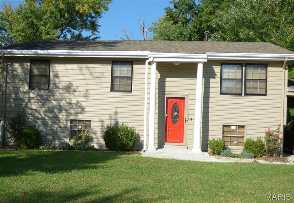 This elegantly remodeled 3 bedroom, 1.5 bath split level home is located on a luxurious large corner lot located on a quiet cul-de-sac. An attached spacious carport offers enough room to accommodate three vehicles. The partially fenced yard with a short picket on one side offers privacy and a shaded space to enjoy the scenery. Shade comes from a host of evergreen trees on all sides. The first floor presents beautifully refinished hardwood floors in the living room and bedrooms, while the kitchen and bathroom feature lovely water-resistant modern tiles. The large kitchen and living room windows offer plenty of sunlight that make the home sparkle! The open architecture style evokes an inviting spacious feeling, suitable for gatherings. The two-seater breakfast bar creates a wholesome bridge between the living room and kitchen. A late model gas range, large refrigerator, and countertop microwave handles your every baking need. The stairwell from the kitchen (as well as the rear entrance leads to an superbly remodeled recreation area with two dining areas, a laundry room, and the second bath. A recent upgrade to PVC plumbing, an updated breaker box, and newly installed gas water heater complete this enticing package.