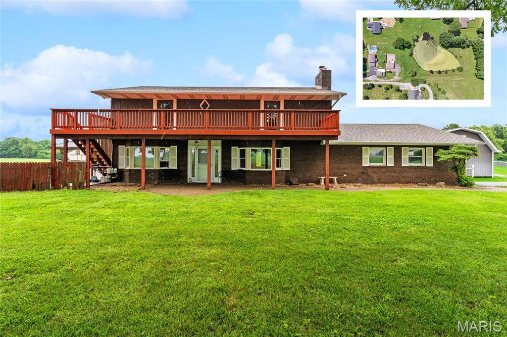 Peaceful country living meets everyday convenience. Situated on 5.4 beautiful acres just minutes from the highway, this one-of-a-kind property offers the space, flexibility, and amenities you've been searching for.
From the moment you arrive, you'll appreciate the privacy, scenic pond, inground pool, and room to spread out, all while being just outside city limits.
The main home features 4 spacious bedrooms and 2.5 bathrooms with thoughtful updates throughout. The main level offers a large bedroom overlooking the pool, an inviting living room with a cozy wood-burning fireplace, built-in storage benches, luxury vinyl plank flooring, and a beautifully updated kitchen featuring granite countertops (2024), pantry, and all appliances that stay. You'll also love the bright sunroom that can double as a formal dining room, plus a convenient laundry room off the garage entrance with an additional shower.
Upstairs, the primary suite is a true retreat with dual closets, a private bath, and balcony access overlooking the pool. Two additional oversized bedrooms—one with shared balcony access—and massive full bath featuring a jetted soaking tub, walk-in shower, double vanity, and generous storage.
Need extra space for family or guests? The impressive in-law apartment offers endless possibilities with its own kitchen, dining area, 2 full bathrooms, laundry, and abundant storage. Whether you're accommodating multi-generational living, long-term guests, or simply need extra room to spread out, this bonus space provides incredibly flexibility.
Step outside and enjoy everything this property has to offer. Spend summer days in the 18x36 inground pool featuring a new liner (2023), filter and pump (2025), entertain on the expansive patio, or relax under the gazebo. Fish from your private dock, launch a kayak on the stocked pond, tend to your garden, raise chickens in the 8x12 coop (2023), explore the woods, or make full use of the pole barn with concrete flooring for equipment, hobbies, or recreational vehicles.

With room to grow, entertain, and make lasting memories, properties like this don't come along often. If you've been waiting for the perfect blend of country charm, modern comfort, and unmatched versatility—this is the one you've been waiting for. Schedule your private tour today before someone else calls it home.