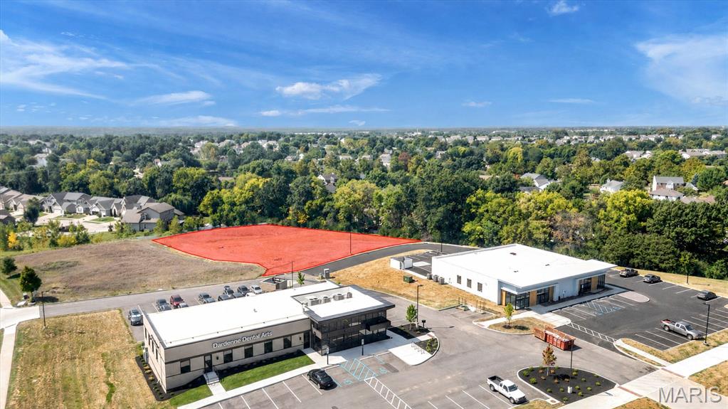 This 1.22-acre development-ready parcel presents an excellent opportunity for a variety of commercial or investment uses. Much of the groundwork has already been completed, with electric, sewer, Gateway Fiber, and curb cuts in place, helping streamline the development process and reduce some of the upfront infrastructure requirements. The site offers flexibility to accommodate approximately a 2,000–4,000 square-foot building, with potential for a larger footprint depending on the proposed use, site plan, zoning, and applicable approvals. The generous lot size also provides room to consider parking, access, landscaping, signage, and other site improvements.  With key utilities and infrastructure already available, this property offers an attractive opportunity for an owner-user, investor, developer, or growing business looking to construct a facility tailored to its specific needs. Whether envisioned for office, retail, service, medical, professional, or another commercial use, the property provides a strong foundation for future development. Bring your plans and take advantage of a site that is already positioned for its next chapter.