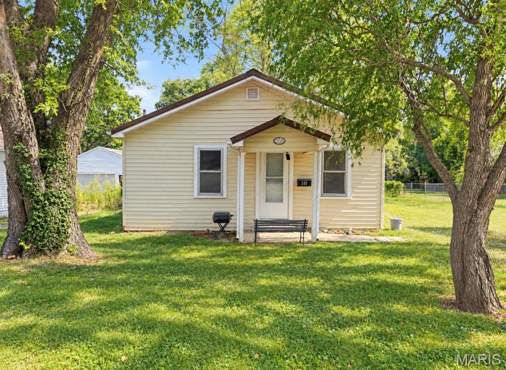Welcome to this beautifully updated three-bedroom, one-and-a-half-bathroom single-story ranch offering the perfect combination of comfort, convenience, and modern style. Thoughtfully refreshed throughout, this move-in-ready home is an excellent opportunity for a first-time homebuyer or anyone looking for an easy-to-maintain property with plenty of outdoor space. Step inside and you’ll immediately notice the modern updates that give the home a fresh and welcoming feel. Recent improvements include newer flooring, updated light fixtures, fresh interior paint, and additional touches throughout that help create a clean, contemporary atmosphere. The functional single-level floor plan provides comfortable living while keeping everything conveniently located on one floor. The home offers three bedrooms with flexible space for family, guests, a home office, or additional storage. With one full bathroom and an additional half bathroom, the layout provides added convenience for everyday living. The living spaces offer plenty of room to relax, entertain, and make the home your own. Outside, the property continues to impress with a very large yard providing plenty of room for outdoor activities, entertaining, gardening, pets, or simply enjoying some extra space. Whether you envision summer cookouts, a play area, a garden, or your own private outdoor retreat, this yard offers plenty of possibilities. A covered front porch creates a welcoming entrance and provides a great place to enjoy your morning coffee, unwind in the evening, or simply relax outdoors. The property also includes a one-car detached garage, offering convenient covered parking along with additional space for storage, tools, lawn equipment, or hobbies. With its single-story design, modern improvements, spacious yard, detached garage, and move-in-ready condition, this home offers a wonderful blend of functionality and value. This property even offers a Brand-new HVAC system and a newer roof.  With the updates have already been completed, allowing the next owner to settle in and start enjoying the property right away. This home is especially well suited for a first-time homebuyer looking for a property that offers both charm and practical features without the need for immediate major improvements. From the refreshed interior to the expansive outdoor space, there is plenty to appreciate. If you have been searching for an updated three-bedroom ranch with a large yard, covered front porch, detached garage, and comfortable single-level living, this property deserves a closer look. Schedule your private showing and come see everything this move-in-ready home has to offer!