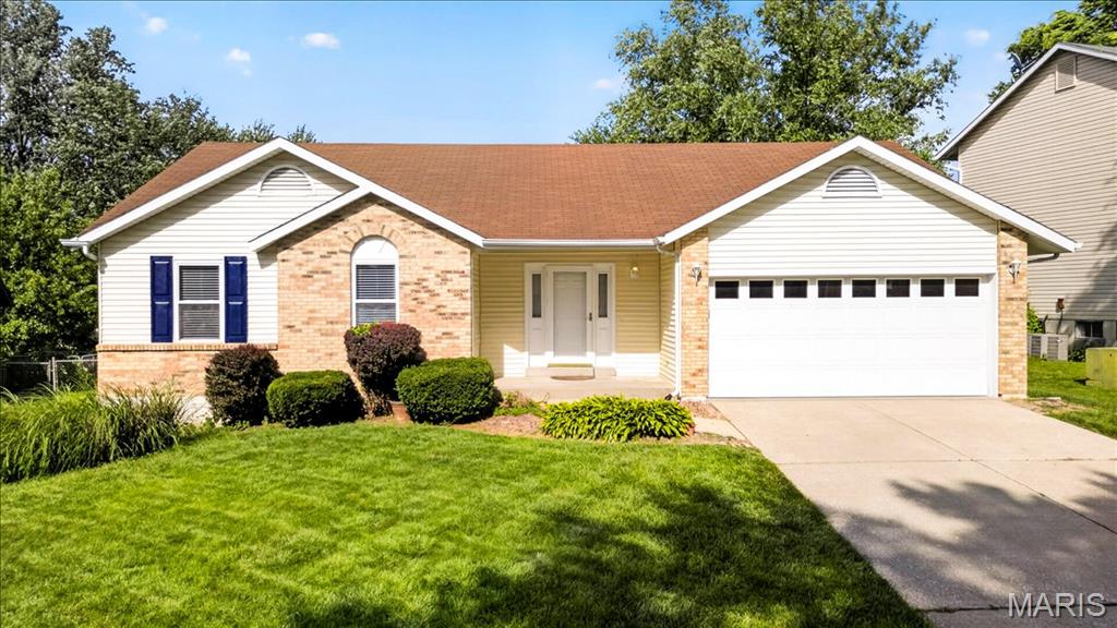Welcome home to this ranch in a sought after neighborhood on a cul-de-sac in St Peters.  Lovely front yard, 2 car garage and covered porch welcome you as you enter to find a beamed vaulted ceiling, gas fireplace, wood floors and popular open floorplan.  The kitchen offers newer dishwasher,  gas oven, tile floors, recessed lighting and opens to a generous back yard and spacious patio.  End the day in your Primary suite with a full bath and double closets. You will love the professionally finished Lower Level including half bath, Recreation area boasting a TV wall and a stunning wood bar with ceramic floor.  Welcome Home!