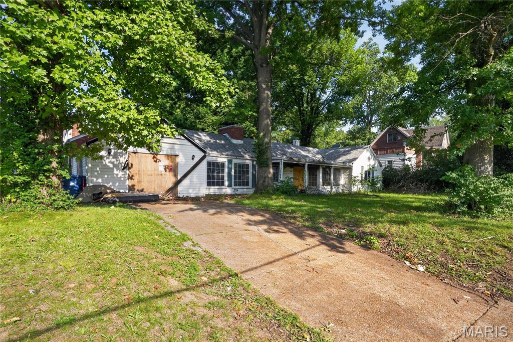 2 bedroom 1 bathroom home for sale. This home could use some TLC and is on a great lot with mature trees.  Sold AS IS