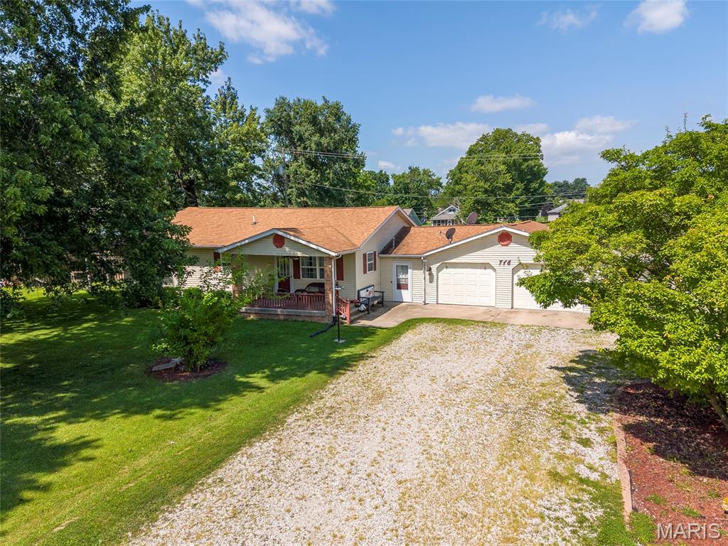 Don't miss this well-maintained ranch home offering the perfect blend of comfort, convenience, and space! Situated on a corner lot just over a half acre, this 3-bedroom, 2-bath home features desirable one-level living and a spacious floor plan. The large master suite offers a private retreat, while the additional bedrooms provide plenty of room for family, guests, or a home office. The heart of the home is the inviting eat-in kitchen, complete with modern custom cabinetry, abundant cabinet space, and a breakfast/coffee bar that's perfect for busy mornings or casual entertaining. Designed with gathering in mind, the home's open living spaces flow effortlessly to the back patio, creating the perfect setting for cookouts, relaxing evenings, or family get-togethers. The partially fenced backyard offers room to play, garden, or simply enjoy the outdoors. The oversized attached 2-car garage provides ample storage and includes a versatile bonus room that can be transformed into a rec room, man cave, she shed, home gym, office, or additional living space to fit your needs. Conveniently located on Route 4, this move-in-ready home is ideal for first-time buyers, growing families, or anyone looking to enjoy the ease of single-level living with plenty of space inside and out.