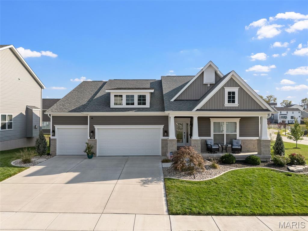 Better than building and ready now, this 2.5-year-old home offers all the upgrades without the wait! Enjoy peaceful lake views from the covered back deck, perfect for morning coffee or relaxing evenings. The open floor plan features a spacious family room with a gas fireplace and abundant natural light. The chef’s kitchen shines with custom cabinetry, a gorgeous backsplash, stainless steel appliances, a large pantry, and an oversized island, ideal for casual meals or entertaining. 
A separate dining room provides the perfect space for hosting. The expansive owner’s suite includes a large walk-in closet with custom cabinetry and a spa-like primary bath designed for true relaxation. Additional highlights include main floor laundry, a massive 3-car garage, and a beautiful backyard oasis. Meticulous professional designed landscaping surrounds the entire home, complemented by a full-yard sprinkler system for easy maintenance. 
This home truly has it all—style, space, and convenience—without the hassle of new construction!