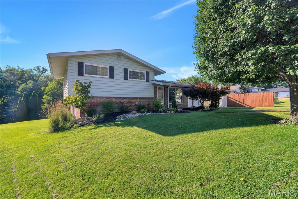 Welcome home to this charming, beautifully maintained 3-bed, 2-bath home located in the highly sought-after Lindbergh School District! Nestled on a quiet cul-de-sac and backing to mature trees, this home offers both privacy and curb appeal with professional landscaping.

Step inside to a great open floor plan featuring fresh paint throughout, original hardwood floors in the living room and bedrooms, and newer carpeting in the partially finished walkout lower level. The kitchen offers a walk-in pantry, gas range, stainless steel appliances, granite countertops, with abundant cabinet and counter space. The dining room features French doors that open to a spacious patio, creating the perfect setting for entertaining family and friends.

Conveniently located near shopping, dining, and entertainment, this move-in-ready home combines comfort, convenience, and charm. Don't miss the opportunity to make this home yours!
