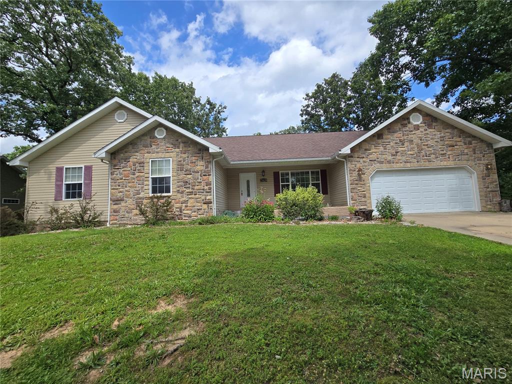 Welcome home to this spacious 3-bedroom, 2-bath ranch-style home offering comfortable single-level living in a highly desirable neighborhood. Situated on a level lot with mature trees and a fenced backyard, this property provides the perfect blend of convenience and outdoor enjoyment.

Inside, you'll appreciate the thoughtful layout and excellent flow throughout the home. A wide hallway makes moving furniture a breeze and adds to the home's open, inviting feel. The primary suite features private access to the new rear deck, creating the perfect spot to enjoy your morning coffee or unwind in the evening.

The fenced backyard offers plenty of room for pets, play, gardening, or entertaining, while the new deck expands your outdoor living space. A spacious 2-car garage provides ample storage and parking.

With its functional floor plan, generous living spaces, and desirable location, this home is ready for its next owner to move in and make it their own.