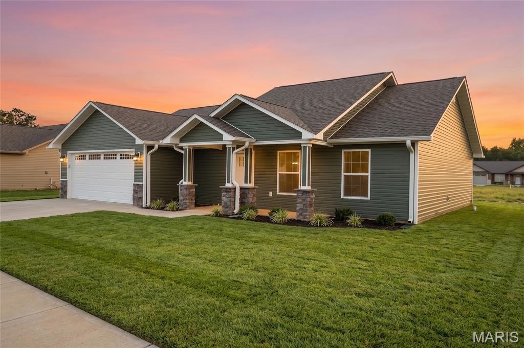 213 Gucci Lane, Poplar Bluff, MO: a brand-new construction home located in a Western Butler County development just south of the Township Line Road roundabout on a paved street. Designed for ultimate low-maintenance living, this all-electric, single-level ranch home features a low maintenance vinyl exterior accented with stone work, an attached two-car garage, and a completely level yard. Inside, the open-concept floor plan is highlighted by vaulted ceilings and durable, contemporary solid surface flooring that runs throughout the entire home. The open layout connects the main living space to a modern kitchen that comes fully equipped with a complete package of brand-new stainless steel appliances. This home will qualify for most all gov't loans. The highly desirable split-bedroom design ensures maximum privacy for the primary suite, which serves as a retreat with its spacious walk-in closet and an ensuite bath featuring a custom tiled shower and dual-sink vanity. With everything completely brand new and situated just minutes from Poplar Bluff's schools, shopping, and medical facilities, this home is entirely turn-key and ready for its very first owner. Yard will be sodded and builder is offering a home warranty.