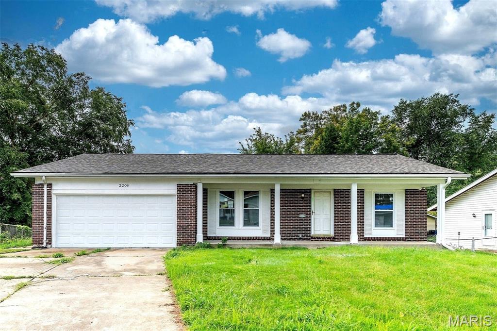 Discover the charm of 2206 Outlook DR, St Louis, MO 63136, a completely remodeled single-family ranch home built in 1969. This residence has been thoughtfully updated, offering a fresh and inviting atmosphere for its next owners. The recently updated kitchen is a culinary delight, featuring sleek stainless steel appliances that complement its modern design. This space is designed for both everyday meals and entertaining. With three comfortable bedrooms and two well-appointed bathrooms, this home provides ample space for relaxation and personal routines. An attached 2 car garage offers convenience and additional storage, while a welcoming porch provides a pleasant spot for outdoor enjoyment. This meticulously updated ranch home is ready to embrace its new residents with comfort and style.
