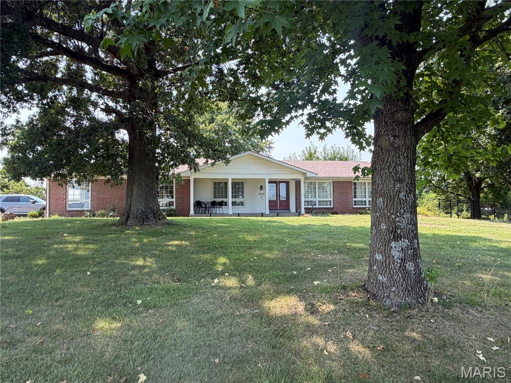 If location is important to you, come check this one out!!  Sprawling ranch home with 3 bedrooms, 2 baths, formal dining room, eat in kitchen, huge office space, and main floor laundry.   Home features a vaulted ceiling, fireplace, new flooring, full walkout basement, oversized side entry garage, nice deck overlooking a huge fenced in backyard and so much more..   Large lot in Washington School District.  Call today!