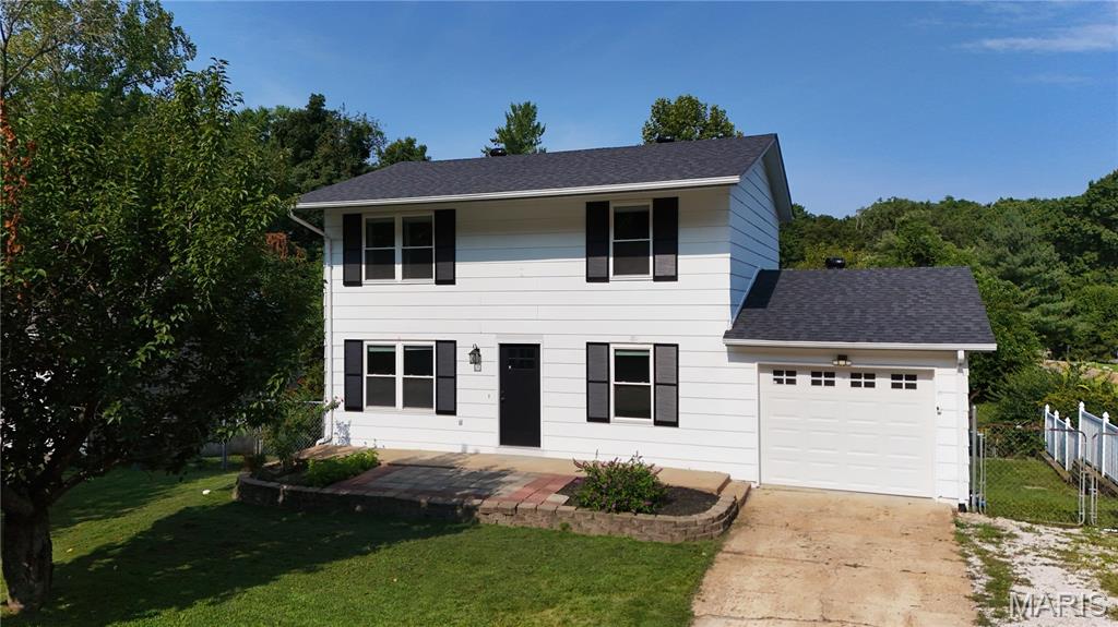 Welcome home to this beautifully refreshed 3-bedroom, 1.5-bath home featuring stylish updates throughout. The main level offers newer flooring, neutral paint, and a bright modern feel. The spacious living room flows seamlessly into the dining area, creating an inviting space for both everyday living and entertaining.
The newly updated kitchen is sure to impress with newer countertops, cabinetry, and stainless-steel appliances. A classic white subway tile backsplash adds the perfect finishing touch to this clean and contemporary space. A convenient half bath, complete with a new vanity and fixtures, rounds out the main level.
Upstairs, the updates continue with new lighting in each bedroom and a nicely sized hall bathroom featuring the same fresh, neutral aesthetic found throughout the home.
The walk-out basement provides abundant storage and offers a fantastic blank canvas for future additional living space, a recreation room, home office, or hobby area.
Step outside to enjoy the large patio and terraced, fenced-in yard - perfect for relaxing, entertaining, or enjoying time outdoors. A storage shed provides even more convenience for tools and outdoor equipment.