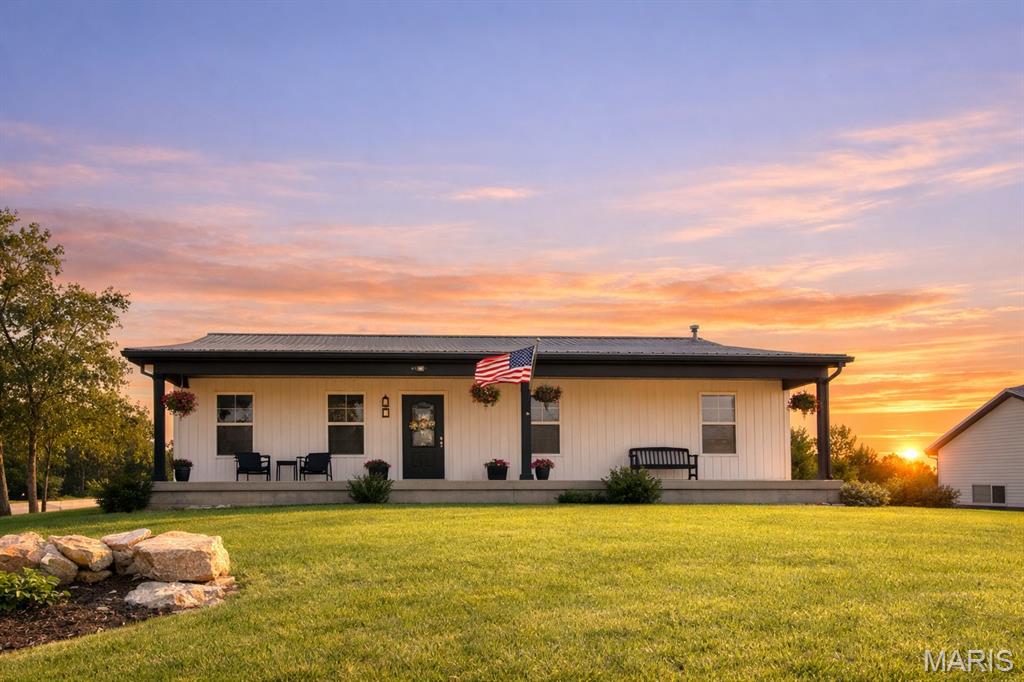 Nestled in a well-established subdivision, this stunning 3-bedroom, 2-bath home offers 1,426 square feet of modern comfort and style. Built just three years ago, it combines country charm with contemporary design. Step onto the spacious front porch, accented by LED recessed lighting that spans the length of the home. Inside, you’ll find a large open great room with luxury vinyl plank flooring and vaulted ceilings, flowing seamlessly into the open-concept kitchen featuring granite countertops and modern finishes.

The primary suite boasts a tray ceiling, walk-in closet, and a private bath with granite countertop and onyx shower. Two additional bedrooms, main-floor laundry, and an unfinished basement with rough in for a future third bathroom, provide flexibility and convenience.

A two-car garage completes the home, set on a nicely landscaped corner lot with a backyard patio perfect for relaxing or entertaining.