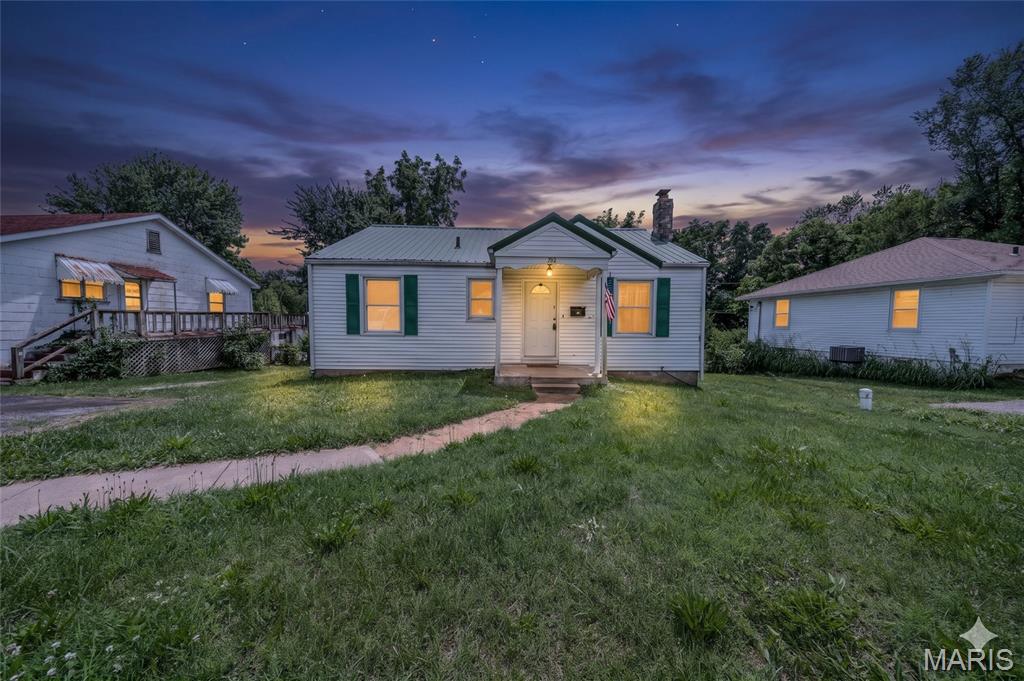 Charming Bungalow in the Heart of Rolla! Whether you're searching for your first home or looking to add a solid property to your investment portfolio, this adorable 2-bedroom, 1-bathroom bungalow is full of potential. Conveniently located in the heart of Rolla, this home features a full unfinished walk-out basement offering abundant storage space and room for future possibilities. Enjoy relaxing mornings on the covered front porch or entertaining on the back deck overlooking the backyard. With its inviting charm, practical layout, and excellent location close to local amenities, this home is one you won't want to miss. Schedule your private tour!