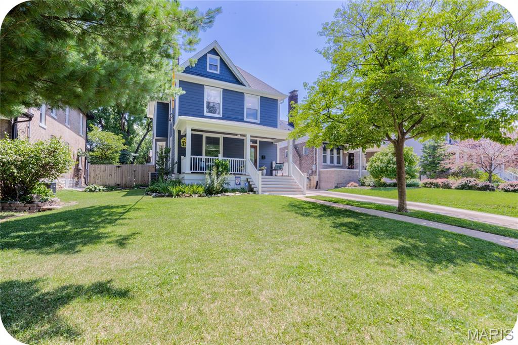 Open House Sunday 7/26 from 1-3pm. If you love walking through Maplewood, chances are you've admired this house. With its picturesque front porch, timeless curb appeal, and prime spot just blocks from Living Room Coffee, Schlafly Bottleworks, and the best of downtown, it's the kind of home people slow down to appreciate. Step inside to find the original staircase, a traditional floor plan, and the character that makes historic homes so enduring. Sunlight fills the spacious living room before flowing into the dining room and an updated kitchen featuring a beautiful waterfall-edge countertop. Even the powder room has personality, thanks to its fun wallpaper. Upstairs offers a full bathroom with walk-in shower and three bedrooms, plus a fourth currently serving as the dream second-floor laundry room—with the flexibility to become a bedroom again or even a future primary ensuite. The finished third floor, complete with new heating and cooling, makes the perfect guest space, office, or bonus living area. Outside, upgraded Hardie siding and an oversized two-car garage with a finished upper level and new mini-split provide even more versatility. Beautifully maintained, full of original charm, and located in the sought-after Maplewood-Richmond Heights School District, this is one of those homes that's every bit as special inside as it is from the sidewalk.